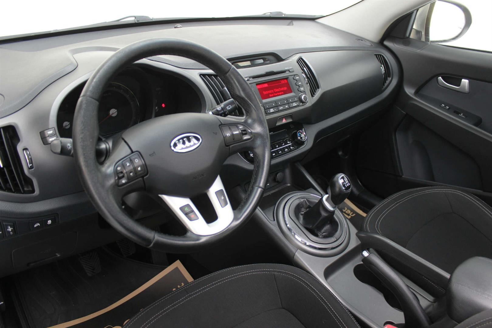 Kia sportage 2010 интерьер